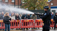 Water cannon fired in latest disorder after Belfast knife attack