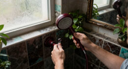 A Tiny Bathroom Went From Grimy To Cozy After A "Gothic-Aquatic" Redo